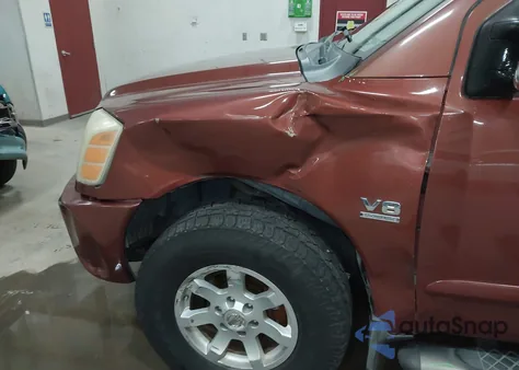 2004 Nissan Titan Le z USA, uszkodzony, nr VIN 1N6AA06B24N529143
